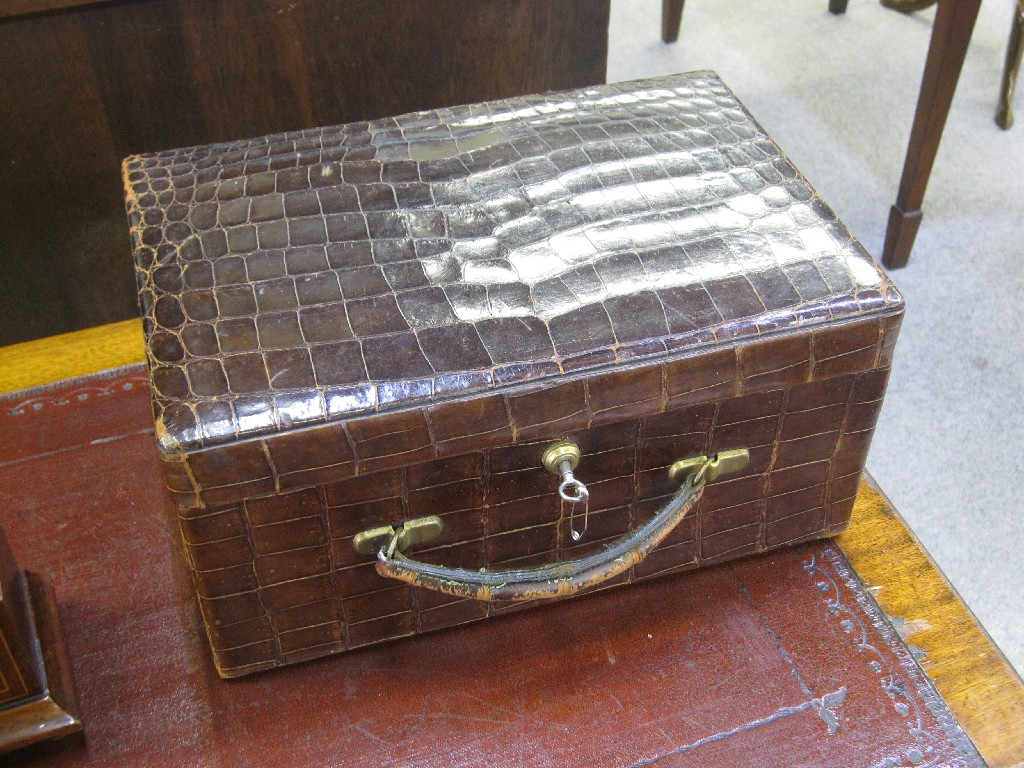 Appraisal: Crocodile skin jewellery box with green leather velvet and taffeta