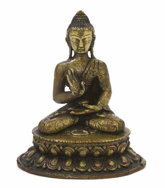 Appraisal: A Bronze Model of a Seated Buddha having one hand