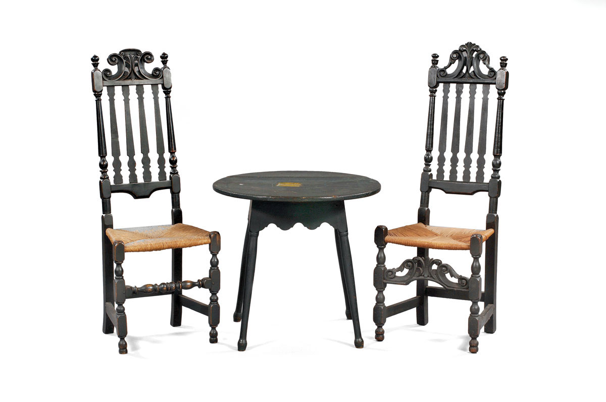 Appraisal: TWO MASSACHUSETTS PILGRIM CENTURY BANISTER-BACK SIDE CHAIRS IN BLACK PAINT