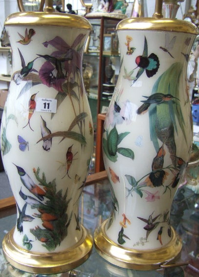 Appraisal: A pair of decolomania baluster table lamps decorated with butterflies