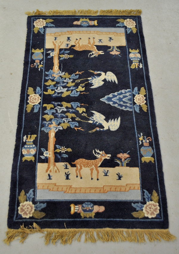 Appraisal: - Peking oriental mat with blue field and decorated with