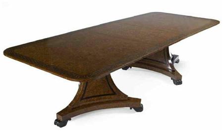 Appraisal: A Regency style burr oak and inlaid pedestal dining table