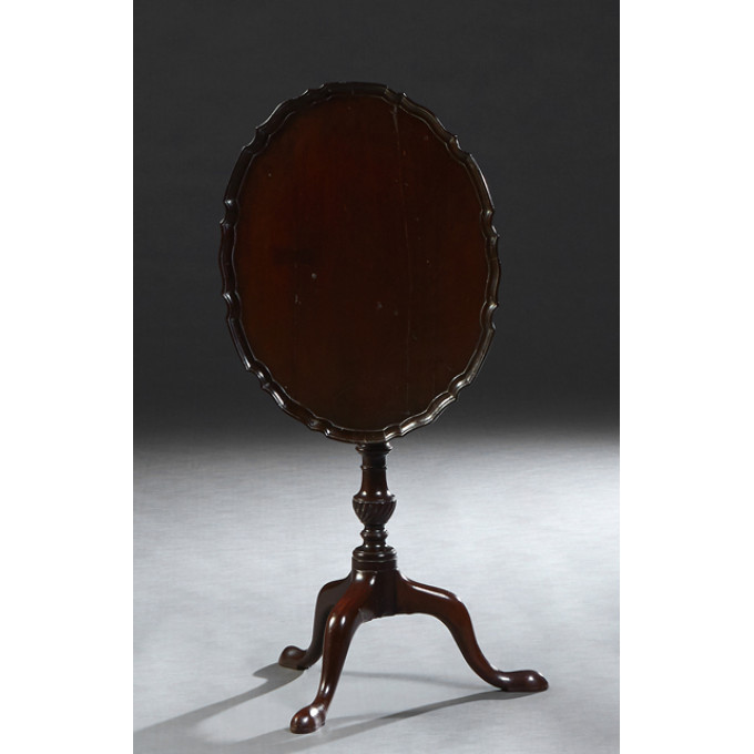 Appraisal: English Carved Mahogany Oval Tilt Top Table c the dished