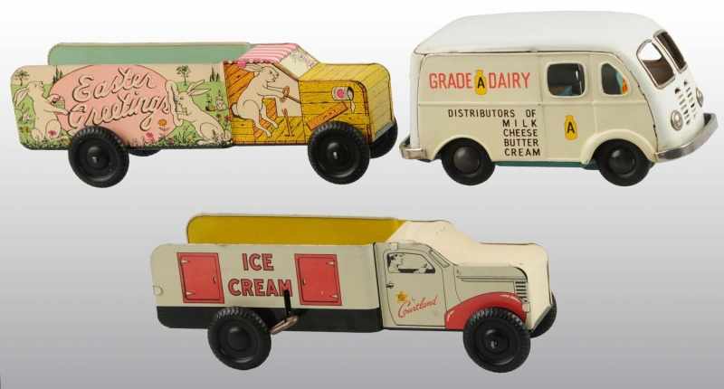 Appraisal: Lot of Tin Milk Ice Cream Vehicle Toys Description Includes