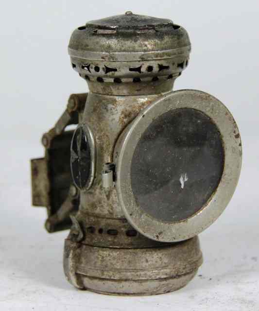 Appraisal: A Lucas Leader electroplate oil motor lamp with red and