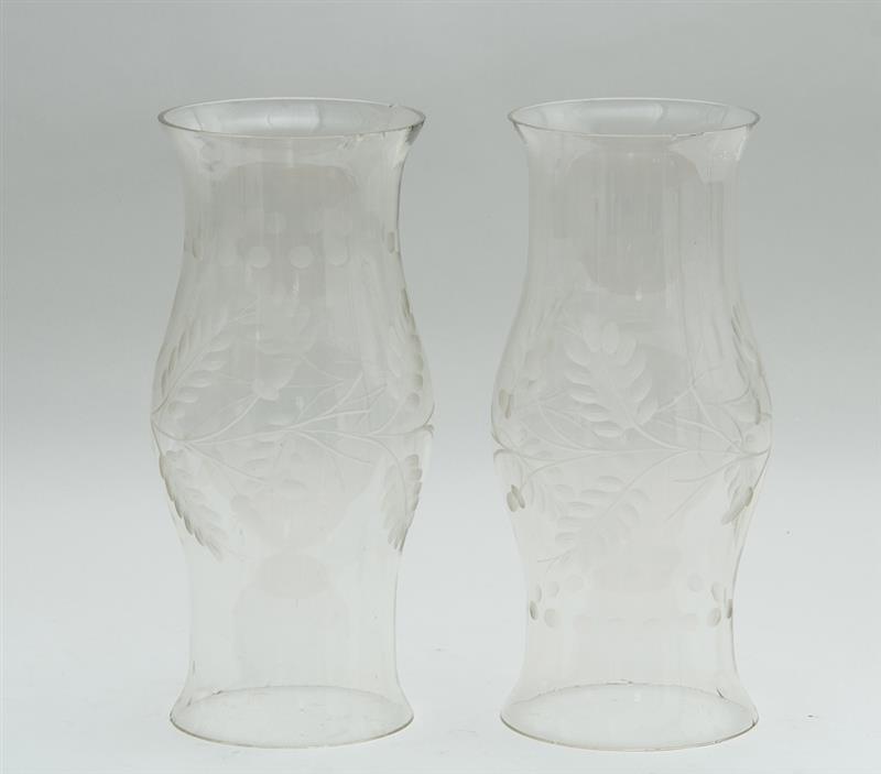 Appraisal: PAIR OF ENGRAVED GLASS HURRICANE SHADES With acorn-laden oak leaves