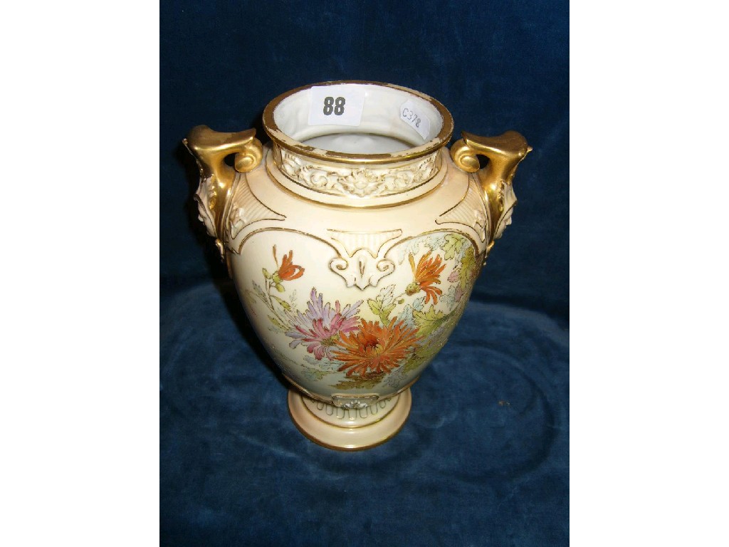 Appraisal: A Royal Worcester ivory ground -handled vase with moulded mask