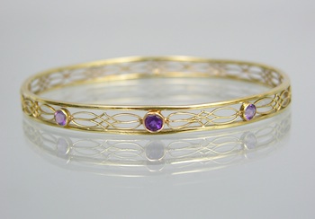 Appraisal: A Ladies' Bangle Bracelet with Amethysts k yellow gold bangle