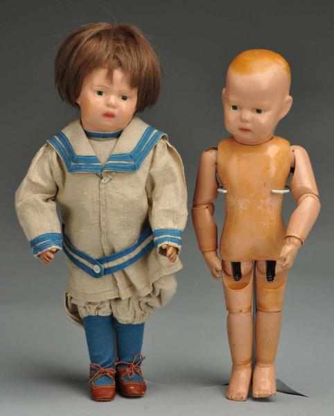 Appraisal: Lot of Schoenhut Toddler Dolls Description Both all wood and