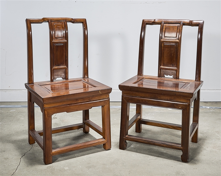 Appraisal: Pair of small Chinese hard wood chairs x x each