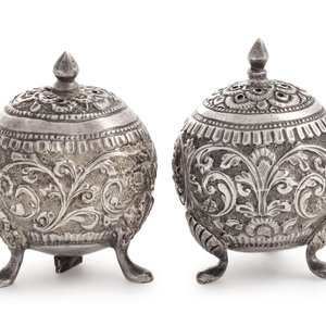 Appraisal: A Pair of Southeast Asian Silvered Metal Casters Likely Indian