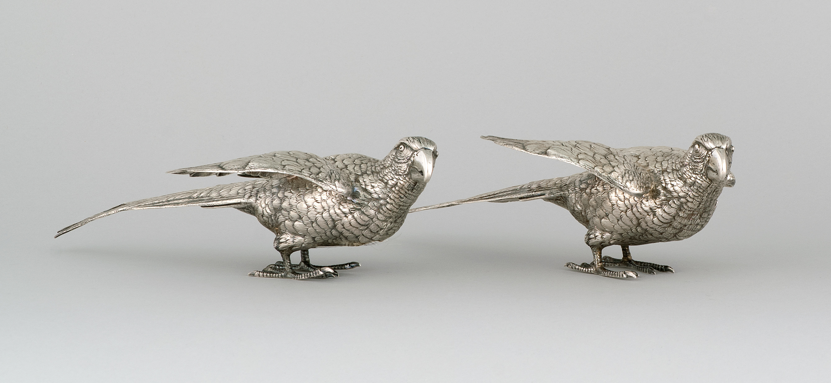 Appraisal: PAIR OF GERMAN SILVER TABLE ORNAMENTS Early th CenturyIn the