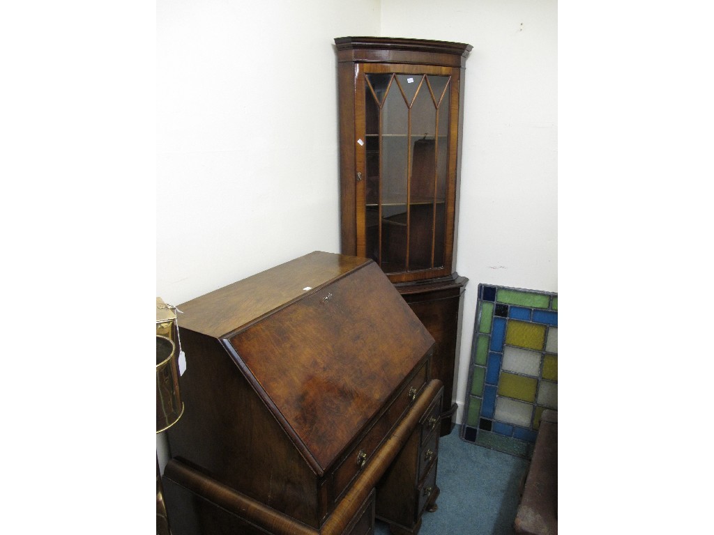 Appraisal: Walnut writing bureau glazed corner cabinet and globe table lamp