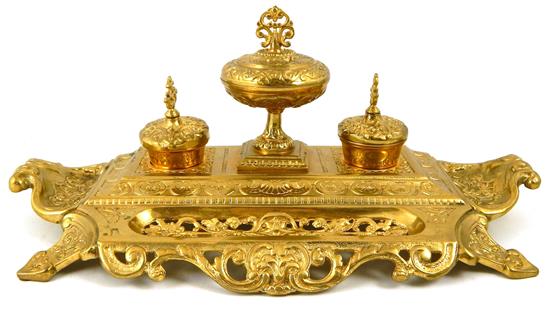 Appraisal: Rococo style cast-metal inkstand with brass finish raised on two