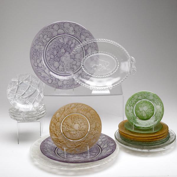 Appraisal: GLASS GROUPING Includes sixteen molded fruit decorated plates of various