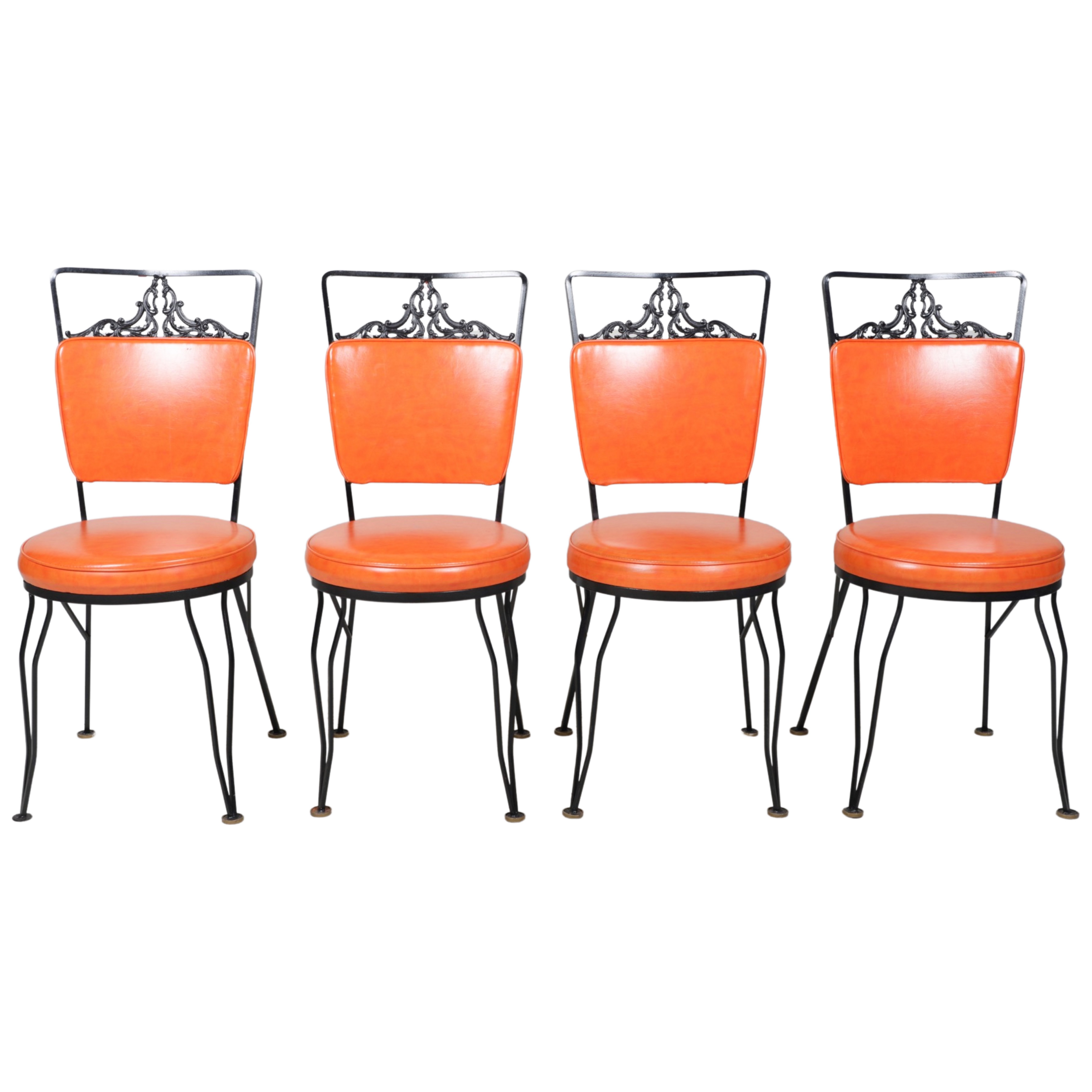 Appraisal: Antarenini Mid Century Modern ebonized pierced iron side chairs orange