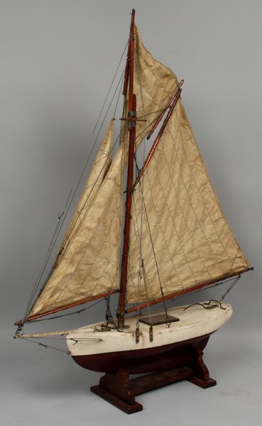 Appraisal: Early th Century pond yacht with lead keel full suit