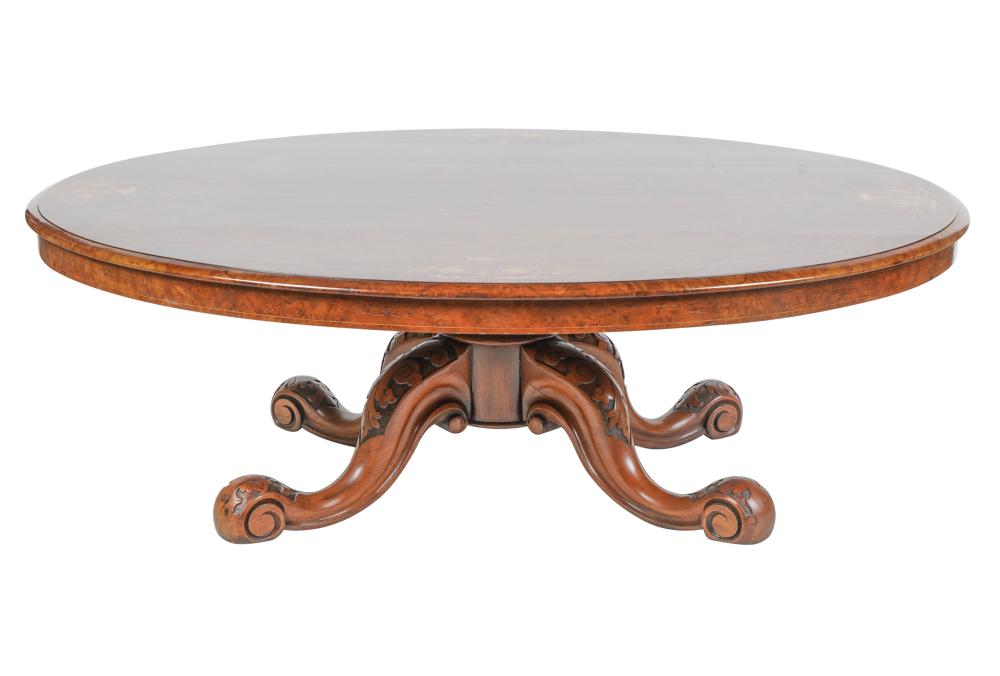 Appraisal: OVAL WALNUT COFFEE TABLEwith marquetry inlaid top Condition some fading