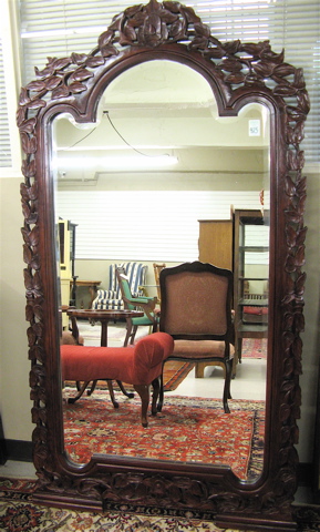 Appraisal: LARGE MAHOGANY FRAMED FLOOR MIRROR with wide frame hand carved