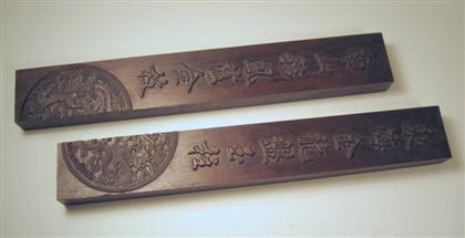 Appraisal: Pair of Chinese carved hardwood scroll weights th century