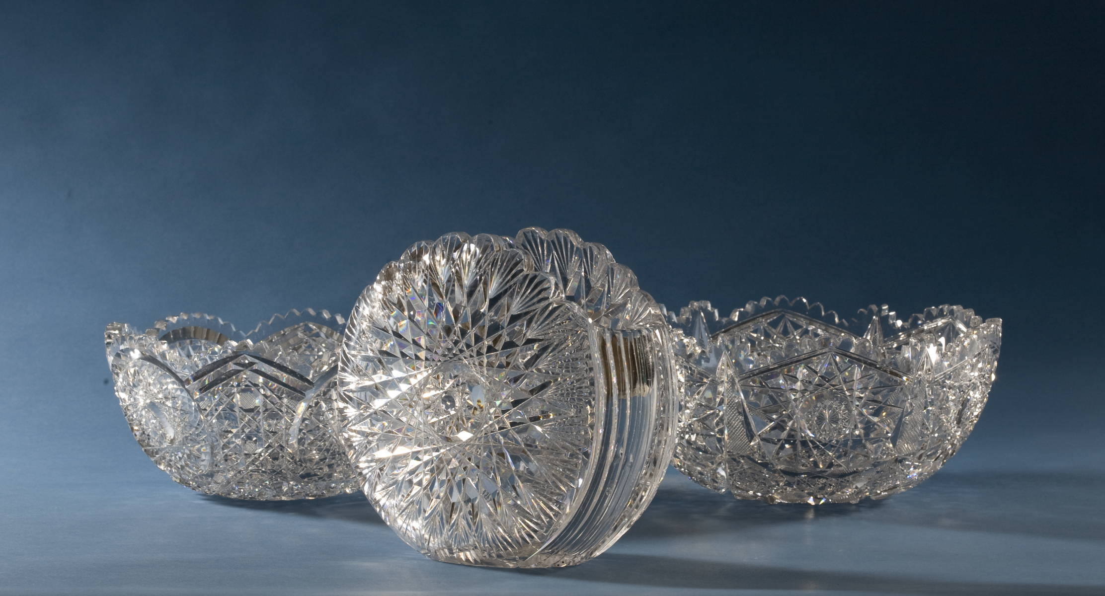 Appraisal: AMERICAN BRILLIANT CUT GLASS CIRCULAR VASE AND TWO FRUIT BOWLS