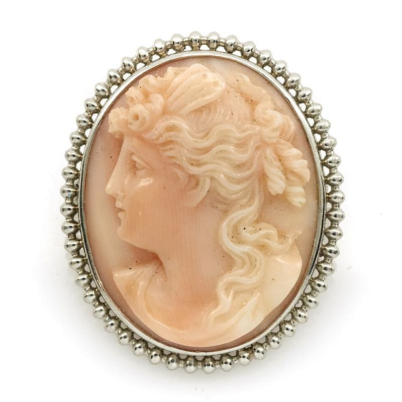 Appraisal: Platinum and coral cameo brooch pendant Platinum and coral cameo