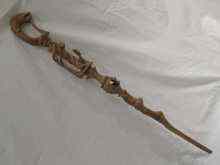 Appraisal: A one piece carved African hardwood walking stick with figures