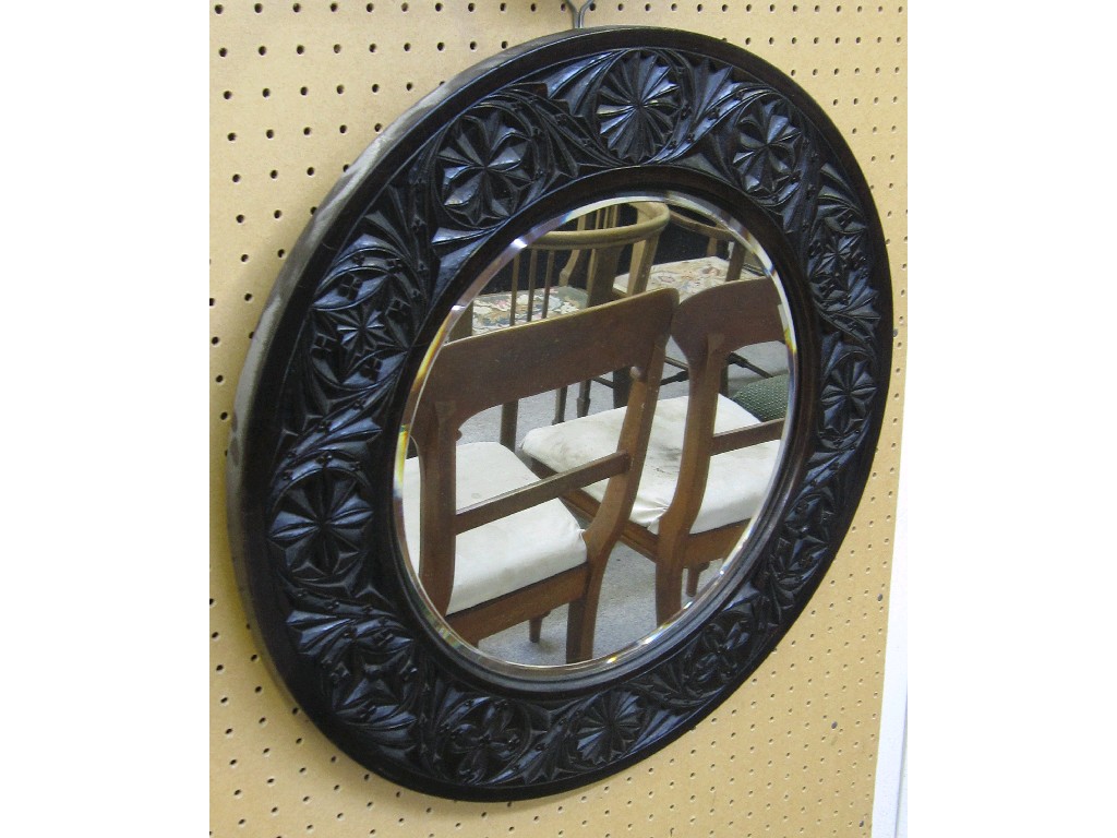 Appraisal: Circular carved hardwood framed wall mirror