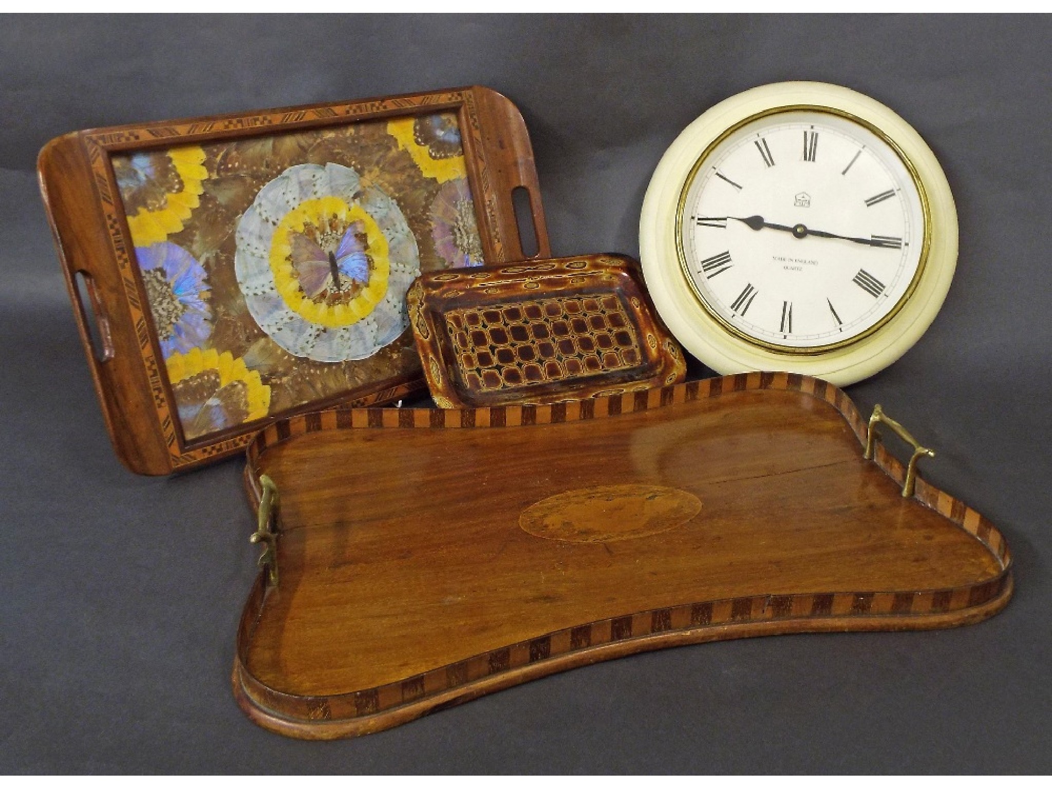 Appraisal: Edwardian serpentine mahogany gallery tray with raised parquetry borders centrally