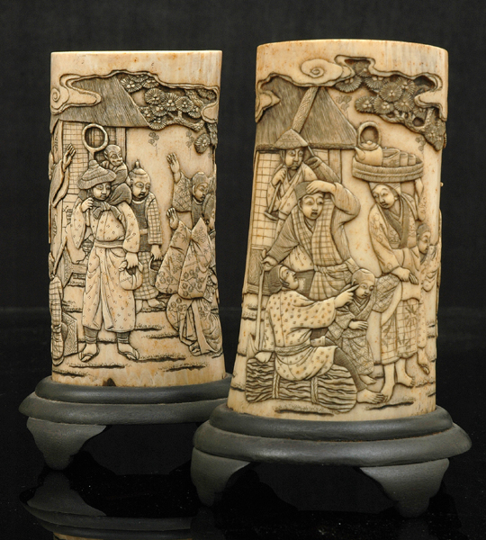 Appraisal: A PAIR OF JAPANESE CARVED IVORY TUSK VASES Meiji Period