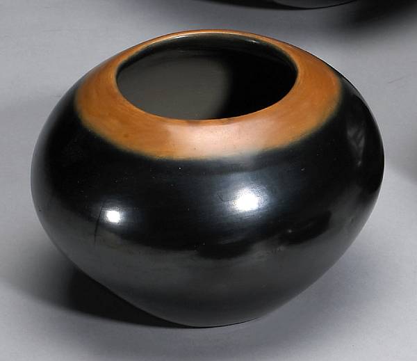 Appraisal: A San Ildefonso black and sienna jar Incised signature Maria