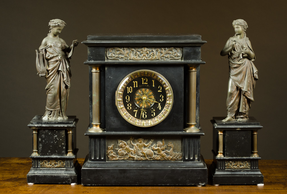 Appraisal: THREE-PIECE FRENCH EMPIRE REVIVAL STYLE CLOCK SET retailed by Hamann