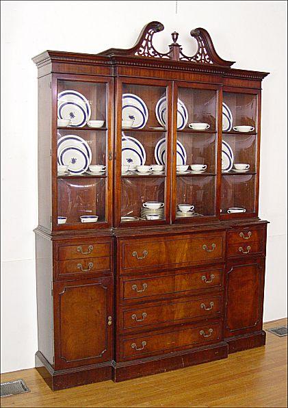 Appraisal: MAHOGANY SECRETARY BREAKFRONT CHINA CABINET Center drawer falls to reveal