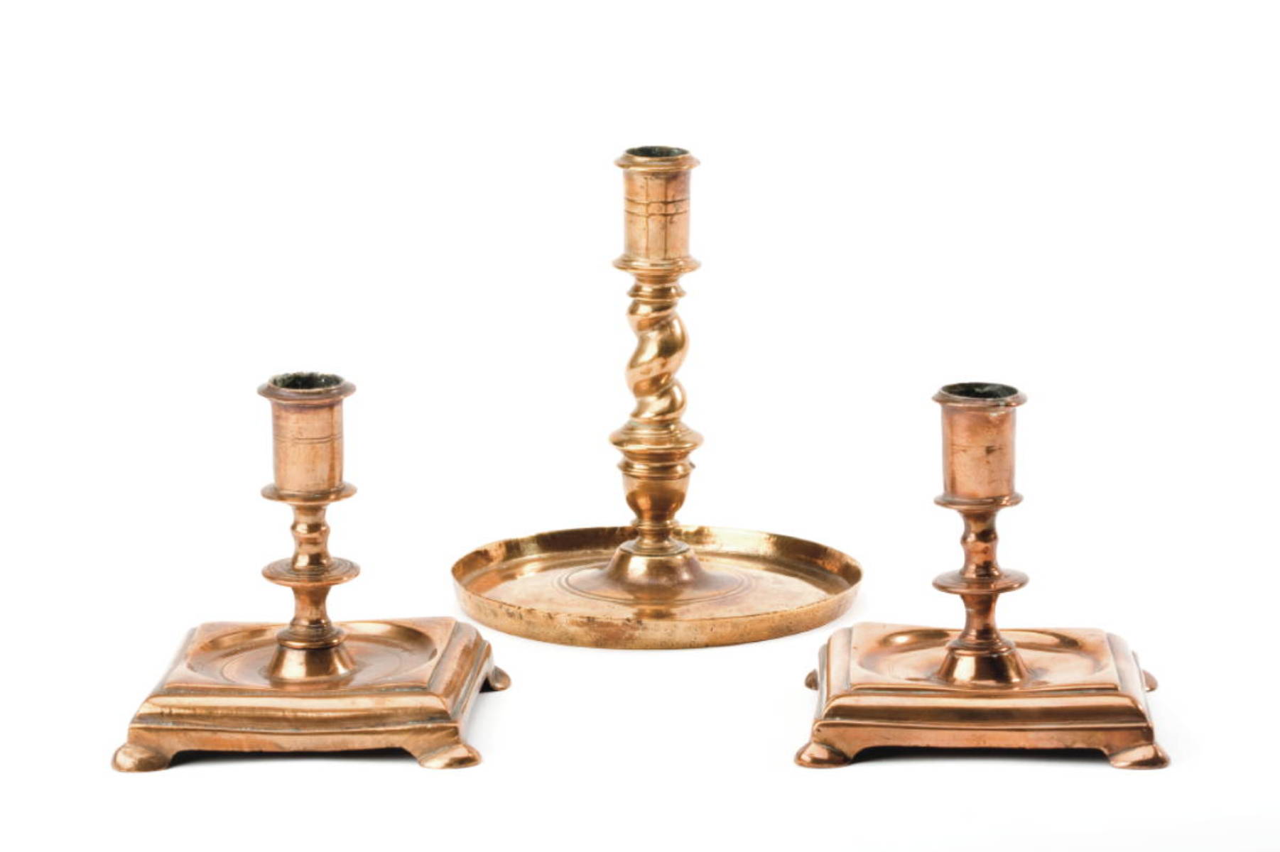 Appraisal: NEAR PAIR OF GEORGIAN CAST BELL METAL CANDLESTICKS AND A