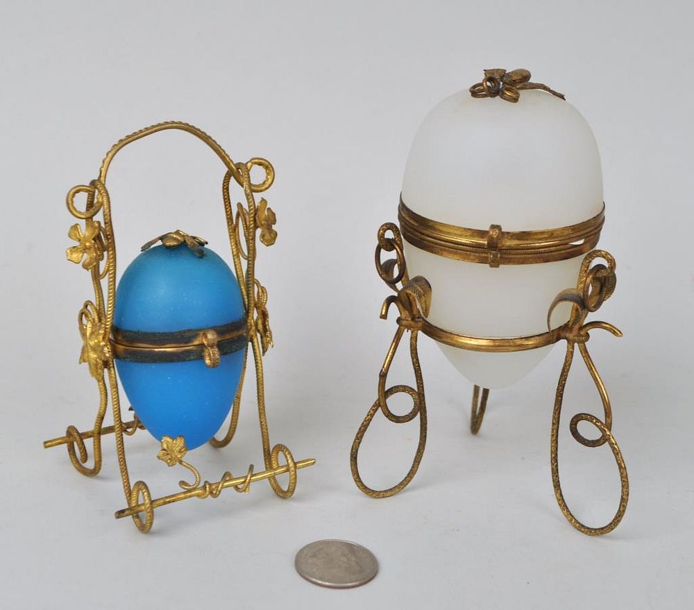 Appraisal: Two Egg Form Scent Bottle Holders Wire Stands one in