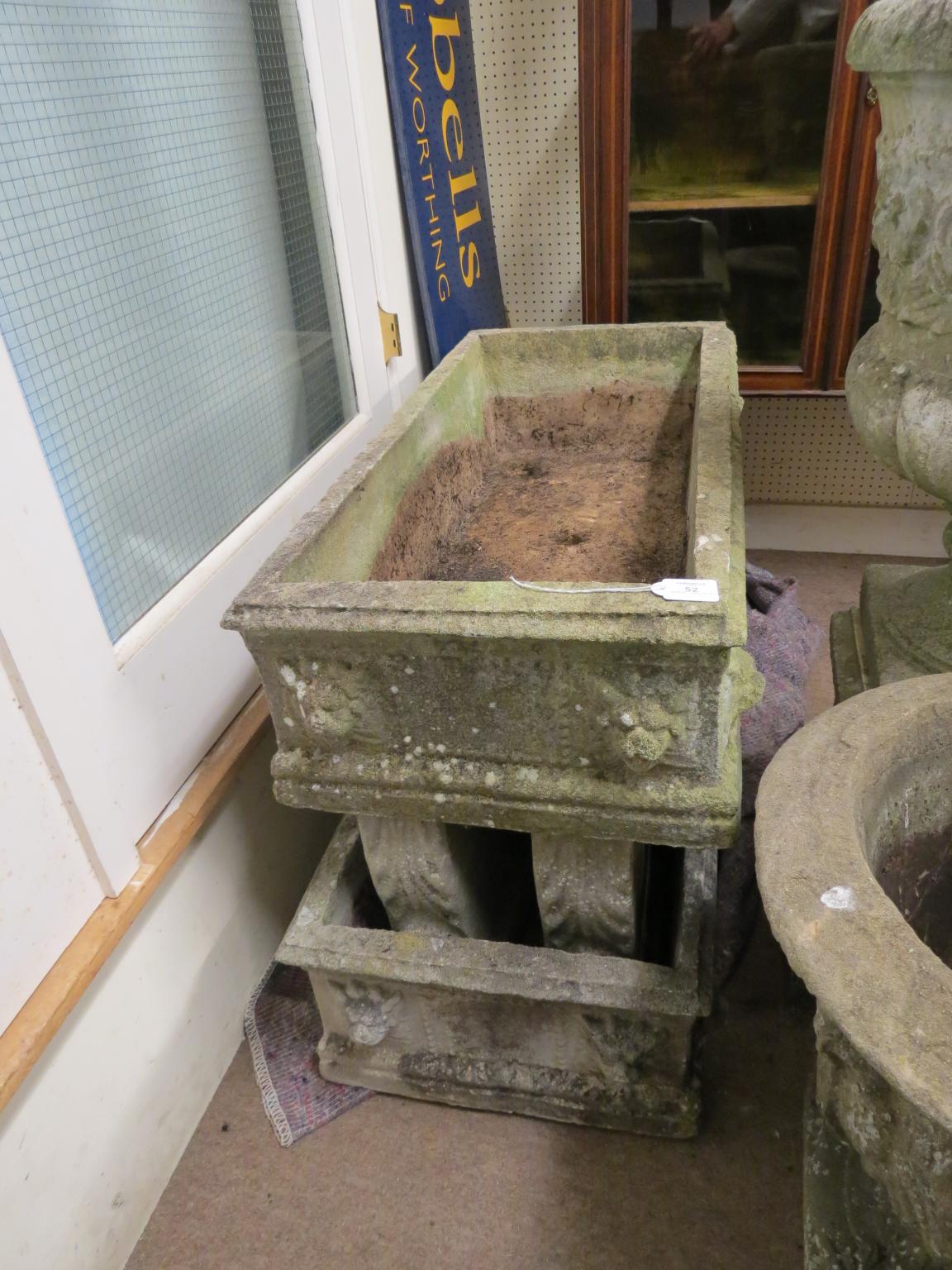 Appraisal: A pair of garden troughs rectangular-shape moulded with lion-masks and