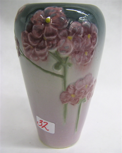 Appraisal: WELLER ETNA POTTERY VASE having raised colorful floral motif hand