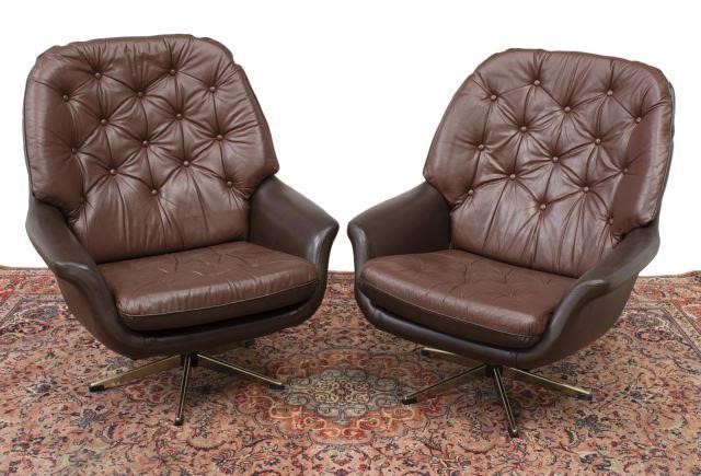 Appraisal: pair Danish mid-century modern leather armchairs c s having buttoned