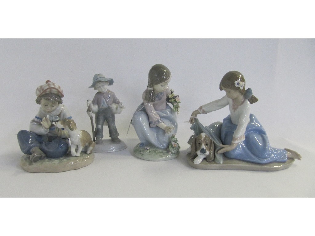 Appraisal: Three Lladro figures including Dog's Best Friend