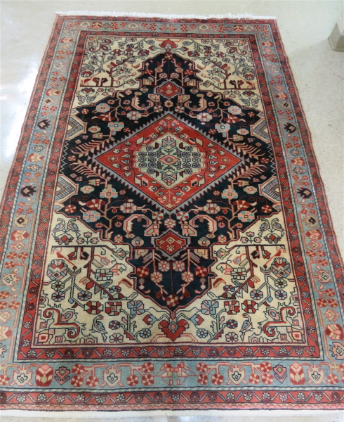 Appraisal: TURKISH TRIBAL AREA RUG hand knotted in a stylized floral