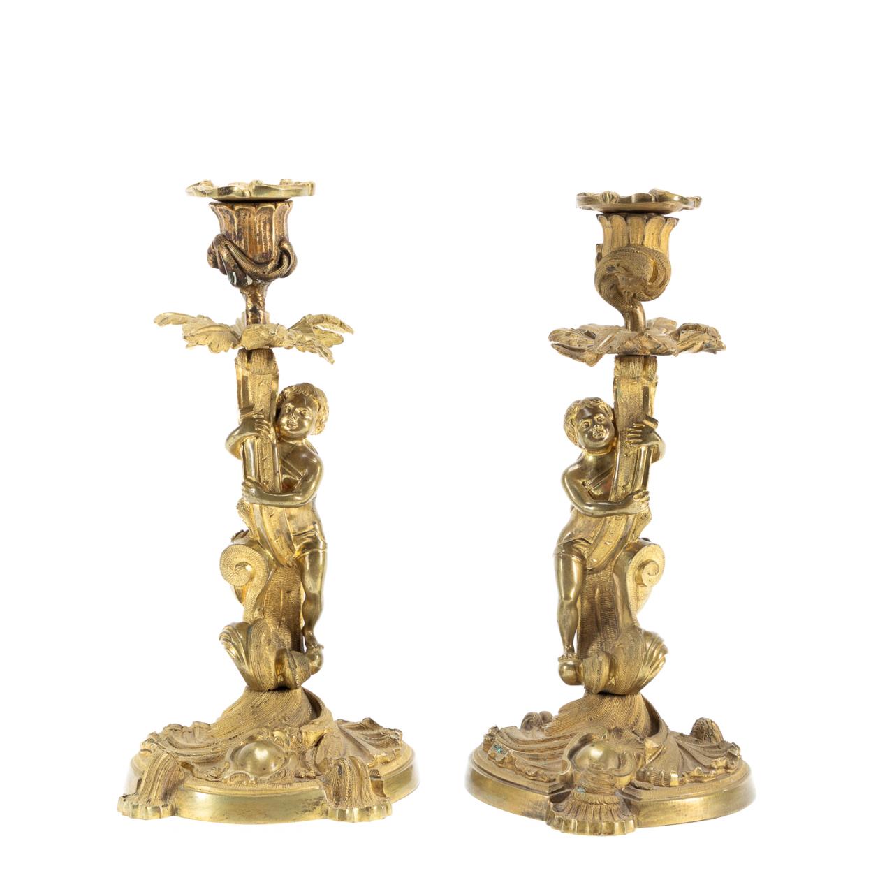 Appraisal: PR LOUIS XV-STYLE FIGURAL BRONZE CANDLESTICKS French th century pair