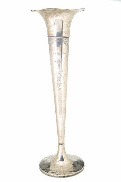 Appraisal: A sterling trumpet vase with engraved decorationLa Pierre Mfg Co