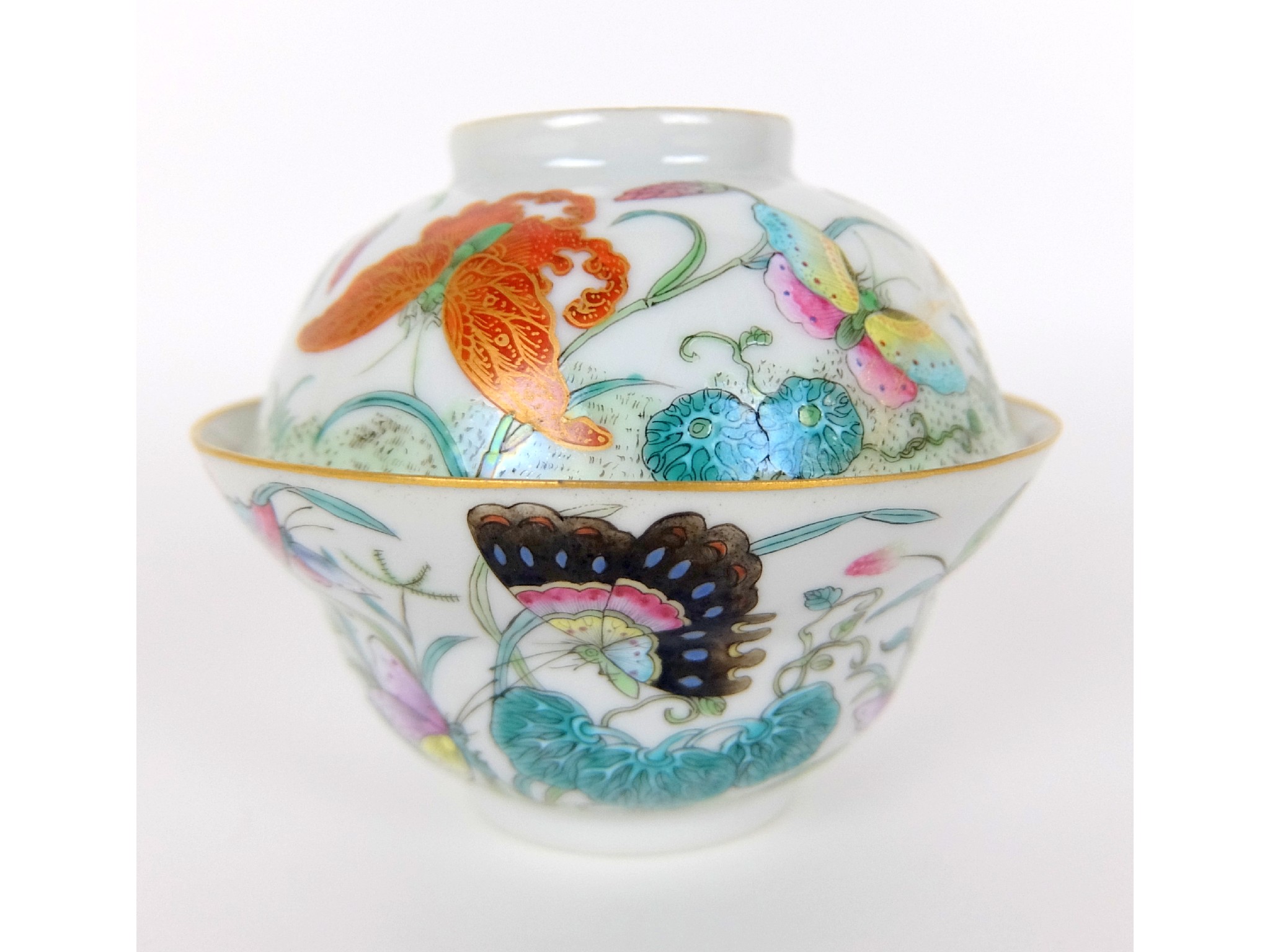 Appraisal: A Chinese famille rose ogee shaped teabowl and coverpainted with