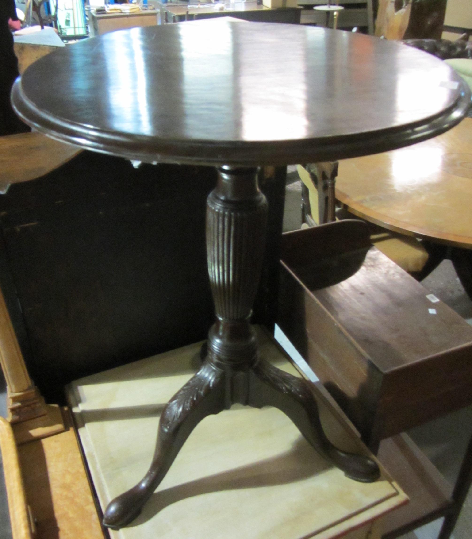 Appraisal: A th century mahogany tripod occasional table with turned supports