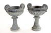 Appraisal: GARDEN URNS - Pair of contemporary carved stone Chinese motif