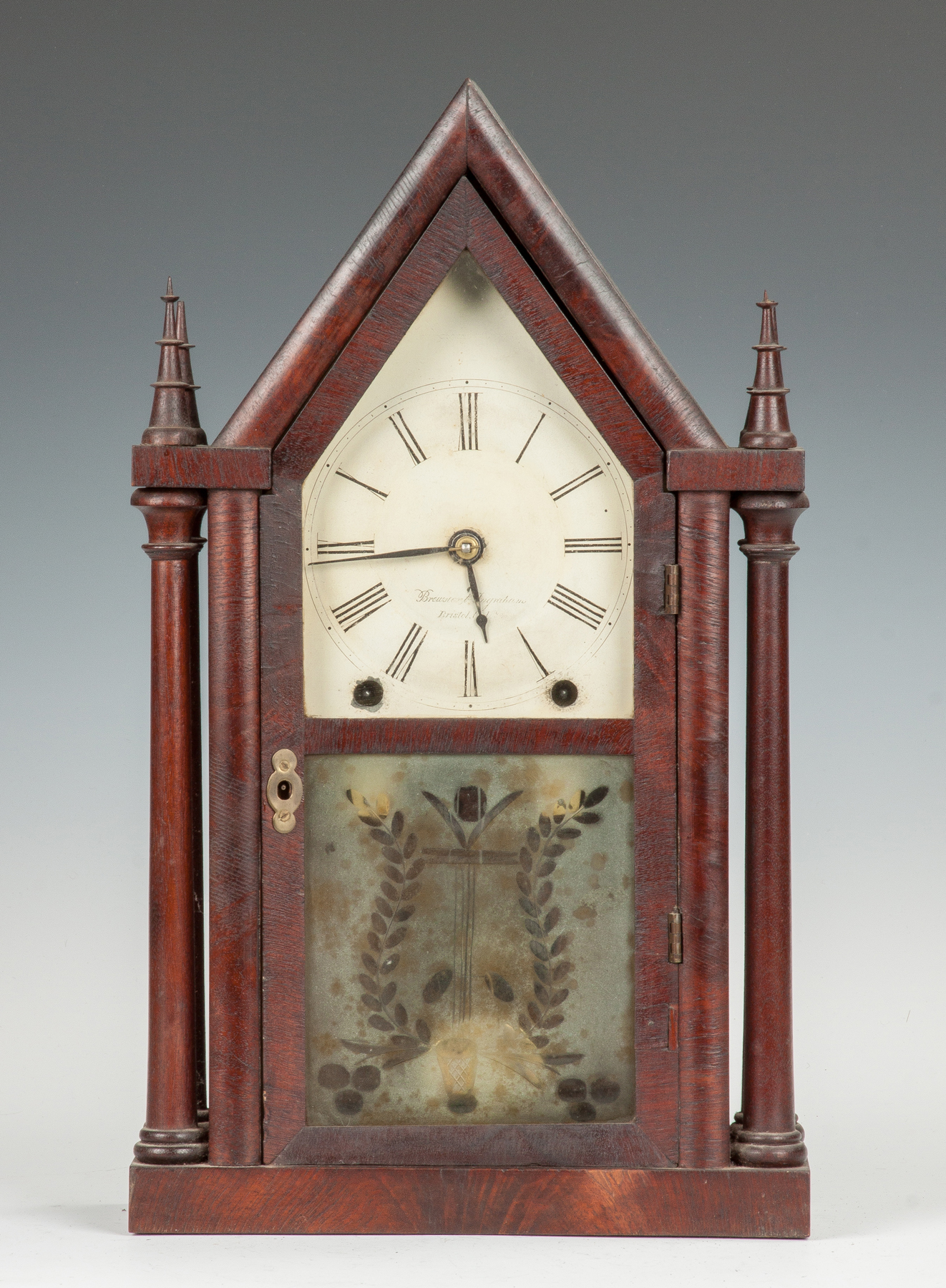 Appraisal: Brewster Ingraham Four-Column Steeple Clock Mahogany case in old finish