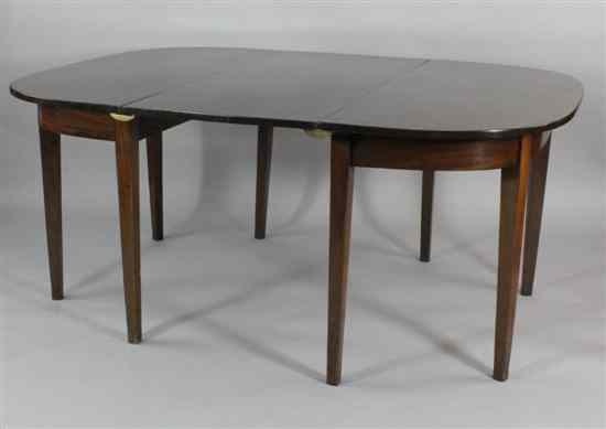 Appraisal: A George III mahogany extending dining table comprising twin 'D'