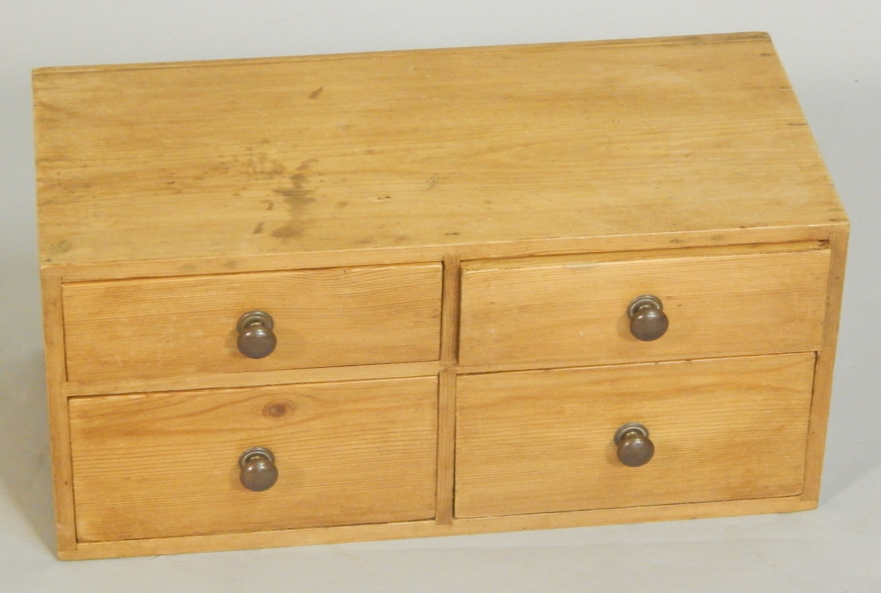 Appraisal: A thC pine bank of four drawers each with metal