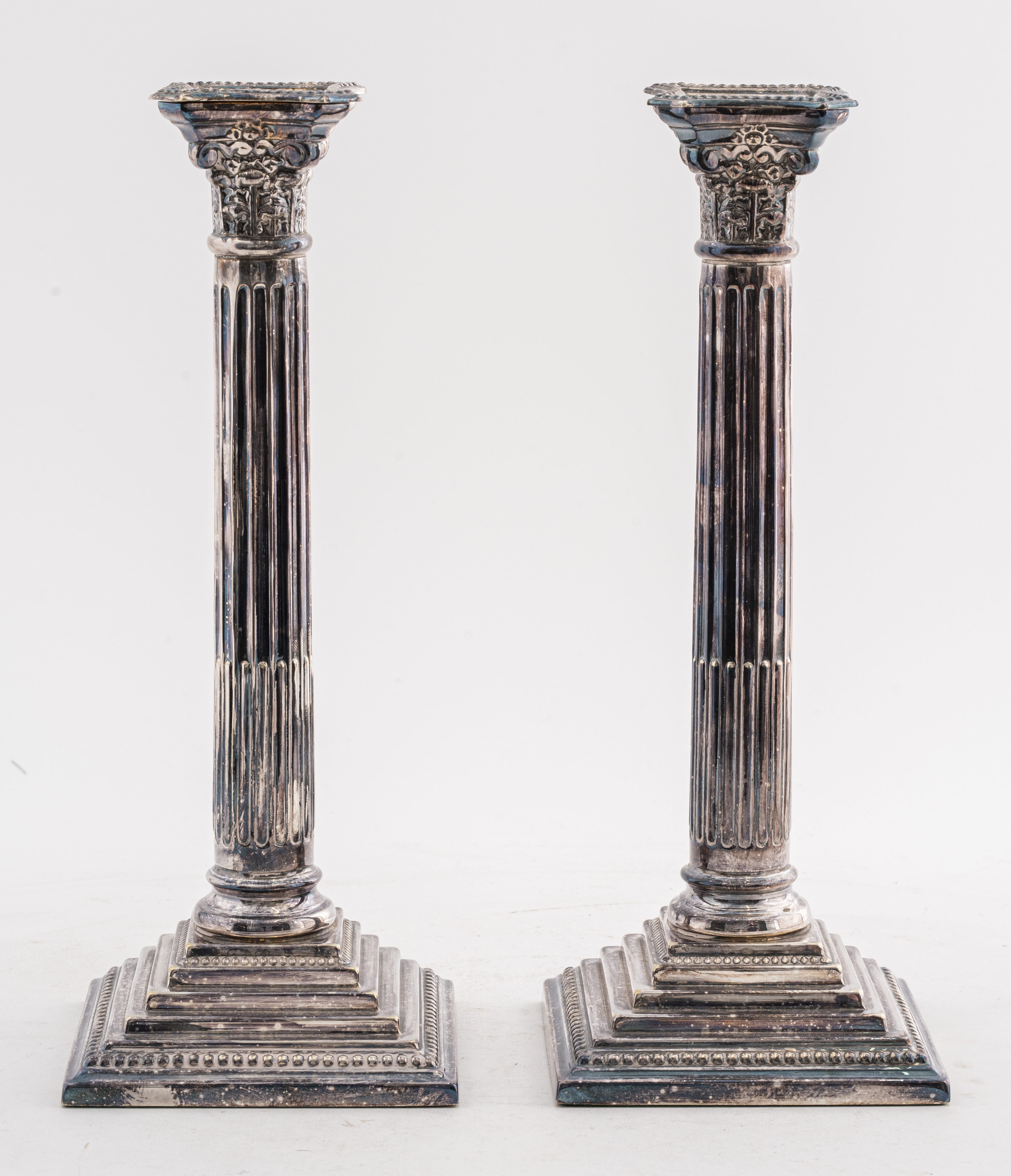 Appraisal: JOHN POUND CO SILVER-PLATE CANDLESTICKS PAIR Pair of John Pound