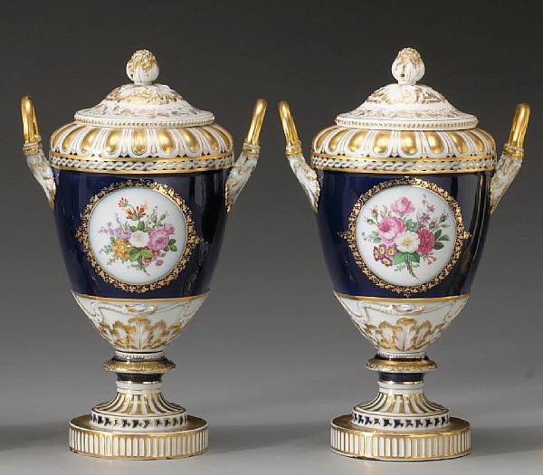 Appraisal: A pair of Berlin K P M porcelain covered urns